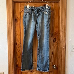 Cowgirl Tuff Co. ladies jeans. Medium denim wash. Size 31x33.